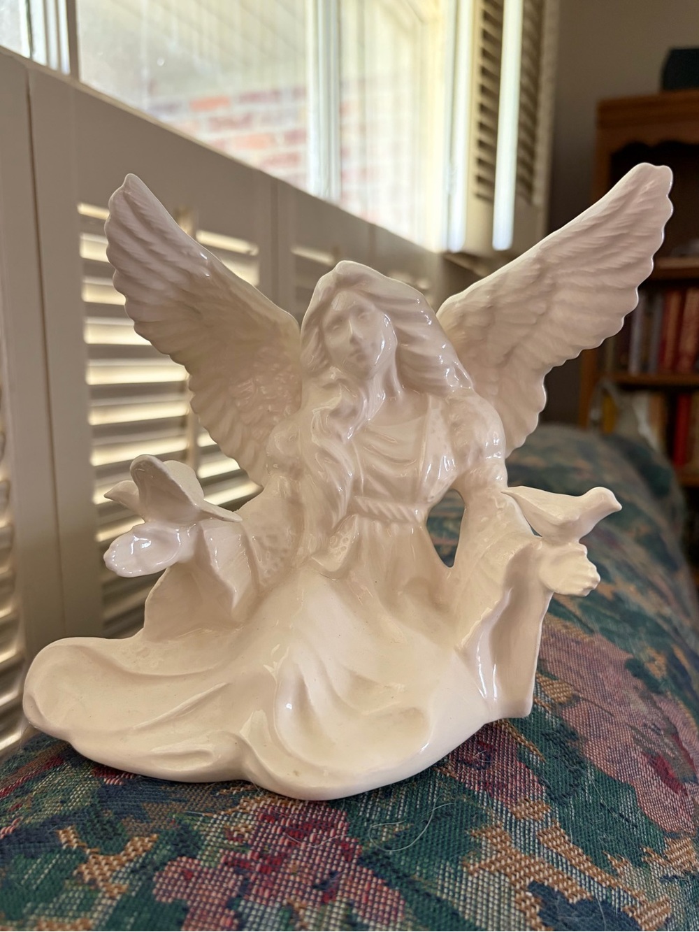 Glossy White Ceramic Angel Sculpture with Doves